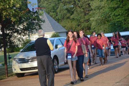Students are greeted by David S. Dockery, president of the university, as they arrive for the annual ice cream social hosted by the Dockerys. More than 350 students attended the event. 