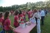 Courtney and Josh Clarke help serve students ice cream at the annual ice cream social held at the home of David and Lanese Dockery.  - Photo by Morris Abernathy