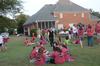 David S. Dockery, president of the university, greets new students at the ice cream social held at his home. - Photo by Morris Abernathy