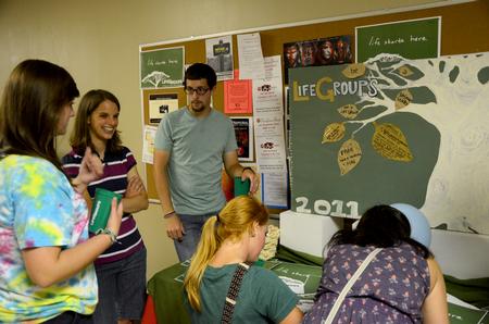 Life Group leaders encourage incoming freshmen to sign up for Life Groups at the Student Activity Fair.