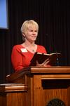 Kathy Southall, director of prayer ministry and encouragement, reads from Psalm 66 to begin chapel.   - Photo by Zac Calvert