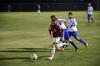 Sutton Shults dribbles the ball through Notre Dame College's defensive line during a soccer game at Union.   - Photo by Zac Calvert