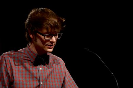 Greg Thornbury, dean of the school of theology and missions, introduces the chapel speaker, Jonathan McIntosh.