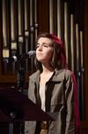 Natalie Wittman, senior English major, leads music for chapel before Andy Pettigrew, International Mission Board missionary in Botswana, speaks in chapel about GO trips and missions. - Photo by Zac Calvert
