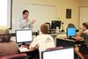 Haifei Li, associate professor of computer science, lectures in class.  - Photo by Kristi McMurry
