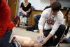 Students learn and practice mouth-to-mouth resuscitation in a PEWS class.  - Photo by Kristi McMurry