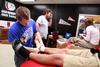 Students practice taping in a PEWS class. - Photo by Kristi McMurry