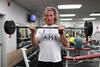 Jake Ryan, senior business administration major, lifts weights in the Wellness Center. Many students take advantage of the fitness facilities available on campus.  - Photo by Kristi McMurry
