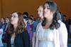 Sophomores Kelsey McFarland and Rachel Robbins worship with the Union community during chapel. - Photo by Anne Richoux