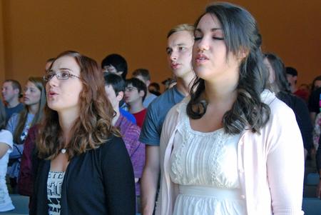 Sophomores Kelsey McFarland and Rachel Robbins worship with the Union community during chapel.