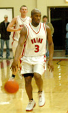 Senior guard Chima Abakwue (3) brings the ball down the floor in Union's 68-65 OT win over Martin Methodist.  Matt Trammell (35) follows close behind. - Photo by Courtney Ross