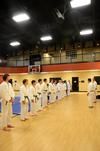 The Union Judo Club officially lines up by rank while judo master Patrick Parker and judo instructor Mario Melendez lead and train.  - Photo by Zac Calvert