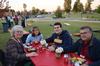 Zachary Foropoulos, Christian studies major, and his family enjoy a hot meal and time together at the Make-a-wish cookout during Family Weekend.  - Photo by Zac Calvert