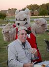 Buster the bulldog goofs off with the father of Travis Cross, sophomore physical science major, at the Make-a-wish cookout during Family Weekend.  - Photo by Zac Calvert