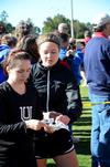 Cross country runners Cally Howell and Allison Martin help out at a high school meet on Union's campus. - Photo by Zac Calvert