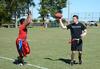 David Virgin, sophomore accounting major, prepares to pass a football during an intramural game on Family Weekend. - Photo by Jacob Moore