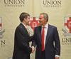 Former British Prime Minister Tony Blair visits with Ben Dockery after the Scholarship Banquet. - Photo by Morris Abernathy