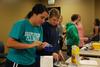 Julia Morrison, junior athletic training major, and Emily Smith, junior nursing major, prepare the ingredients for a bread at Basics 101, a residence life event for female students. - Photo by Anne Richoux