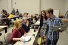 Kylie McDonald and Kirby Lewis, junior political science majors, talk with David Dockery, president of the university, and Kimberly Thornbury, vice president for student services, before a Student Senate meeting. - Photo by Jacob Moore