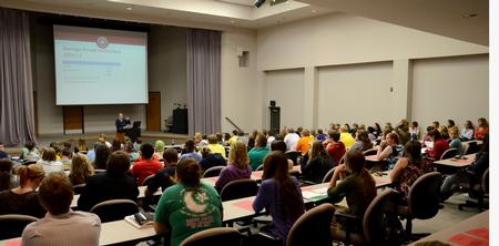 Harvey Hall is filled with students while David S. Dockery, president of the university, speaks during the Student Senate meeting.