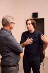 Dr. Graham Cole, Anglican Professor of Divinity at Beeson Divinity School, discusses a mixture of religion and philosophy with Caleb Stallings, senior media communications major. - Photo by Zac Calvert