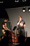 Collin Brown, freshman music major, and Gregory Lewis, freshman undecided major, sing and rap at Open Mic in Barefoots Joe.  - Photo by Zac Calvert