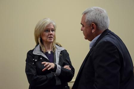 Patrick Melancon, managing director of disaster response and training for Baptist Global Response, talks with Sherri Buntain (left), senior sociology major, following his lecture at the Town and Gown lecture series. 