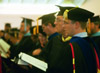 Carl F.H. Henry Center for Christian Leadership Director Greg Thornbury and Library Director Steve Baker sing the University Hymn, <i>Joyful Joyful We Adore Thee</i> at Fall Convocation 2002. - Photo by Jim Veneman