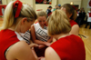 The Union cheerleaders take a moment to pray prior to a Union game. - Photo by Jonathan Blair