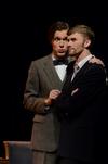 Peter Riggs, sophomore philosophy major, talks to Ben Haws, junior media communications major, about "bunburying" in the theater production of "The Importance of Being Earnest." - Photo by Anne Richoux