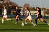 Ashlie Watson fights for possession against Trevecca Nazarene University opponents on Senior Night.  - Photo by Anne Richoux