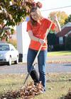Maddie Russo, senior learning foundations major, rakes leaves at Pleasant Plains Baptist Church as part of Campus and Community Day, an annual event where the Union community goes out for service projects in the area.  - Photo by Jacob Moore