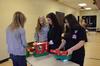 Students help pack Operation Christmas Child boxes during Campus and Community Day.  - Photo by Anne Richoux
