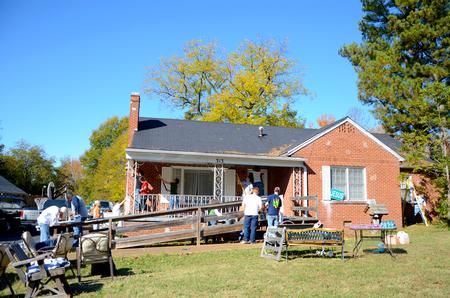 Students volunteer at a local home by painting, fixing gutters, scraping and re-painting for Union's ninth annual Campus and Community Day.