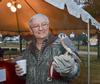 James Huggins, university professor of biology, shows off a falcon at Union Night, a part of the homecoming festivities. - Photo by Morris Abernathy
