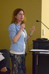 Louisa Saratora, assistant state refugee coordinator with the Tennessee Office for Refugees, speaks at the "Culture and Crisis" Town and Gown lecture series.  - Photo by Anne Richoux