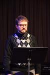 Taylor Worley, associate dean for spiritual life, reads scripture during chapel.
 - Photo by Zac Calvert