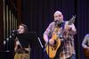 Russ Pflasterer, pastor of City Fellowship, leads music before Taylor Worley speaks in chapel. - Photo by Zac Calvert