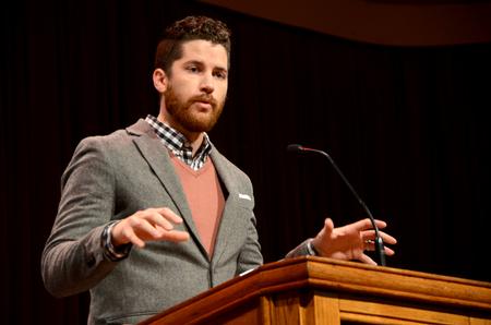 Lee Wilson, director of discipleship, introduces Scott Huelin to speak in chapel.