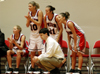 Union's head coach Mark Campbell and other Lady Bullodgs watch the final minutes of a Union win in the NAIA National Tournament. - Photo by Kristen Nicole Sayres