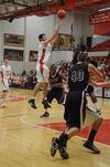 Dani Marti goes up for a shot during a Bulldog basketball game against Cambellsville University. - Photo by Anne Richoux