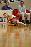 Jennifer Henson keeps the ball in play after falling to the floor during the NAIA National Tournament. - Photo by Kristen Nicole Sayres