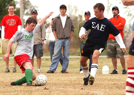 Action from the men's intramural soccer championship between SAE 1 and Onions 1.