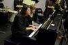 Brandon Swing, sophomore music major, plays piano during the Fall 2011 Jazz Band Concert. - Photo by Jacob Moore