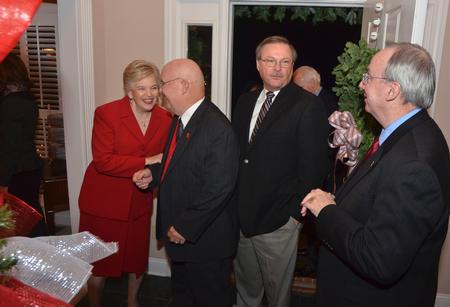 Coach David Blackstock and Tommy Sadler arrive at the Dockery open house Thursday evening.