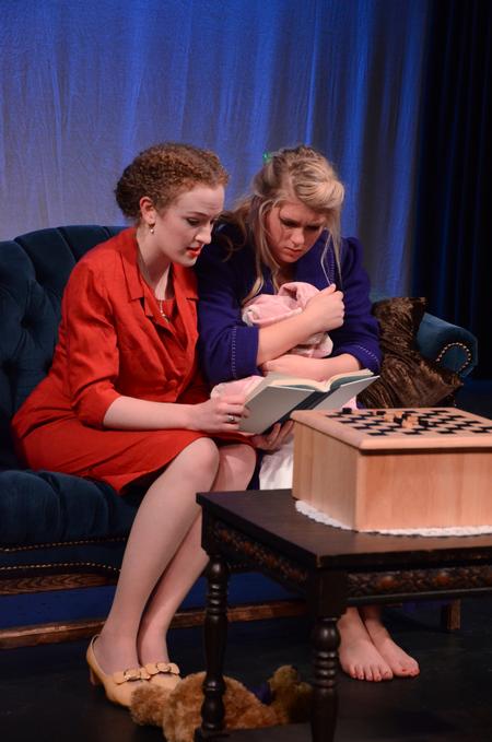 Rachel Moore, senior art major, and Cassie Osborn, junior social work major, play out a scene for Aubrey Swanson's original one-act called 'Inner Sanctum.'