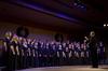 David Dennis, professor of music, leads the choir in a song during "A Union Christmas," an annual performance by the music department. - Photo by Ebbie Davis
