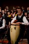 Logan Brasher, sophomore music major, drums for the music department's annual performance of "A Union Christmas." - Photo by Ebbie Davis
