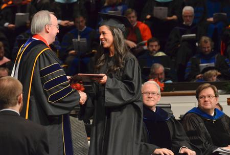 Two hundred ninety-six Union graduates received their degrees at the ceremony, with Frank Page, president of the Southern Baptist Convention’s Executive Committee, delivering the commencement address. Page used the biblical account of Jesus’ encounter with the Samaritan woman at the well to discuss the importance of “irrecoverable moments” in life.  Anna Catherine Ezell receives her Bachelor of Arts in Intercultural Studies from David S. Dockery.
