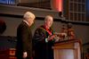 David S. Dockery, president of the university, presents the Robert E. Craig Service Award to Lloyd Hansen at the 2011 Fall Commencement Services held at West Jackson Baptist Church. - Photo by Ebbie Davis
